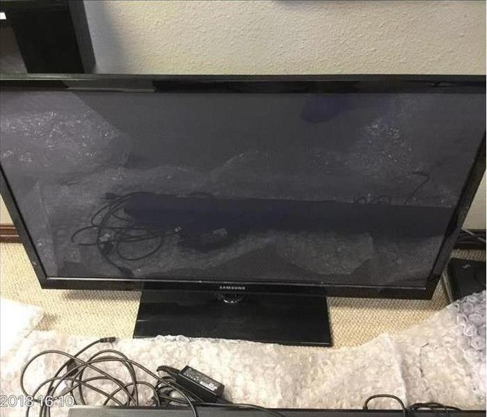 A television being packed out in a home