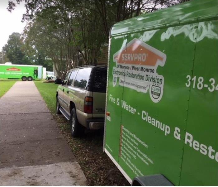 SERVPRO vehicles by home